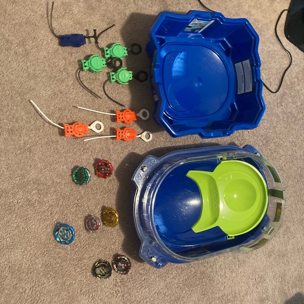 Beyblades included with 2 arenas